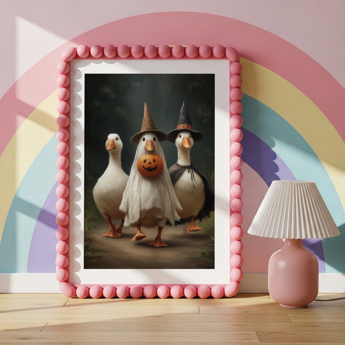 Quirky Halloween geese wall art in a pink statement frame against a colourful wall