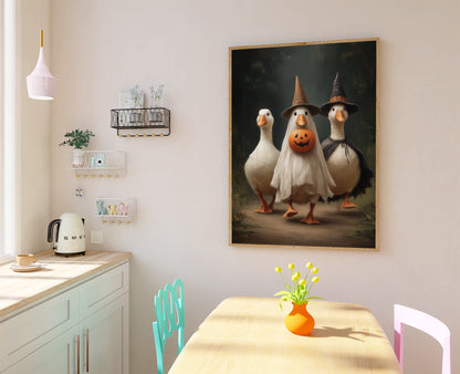 Halloween geese wall print shown as a large unframed poster being handled for display