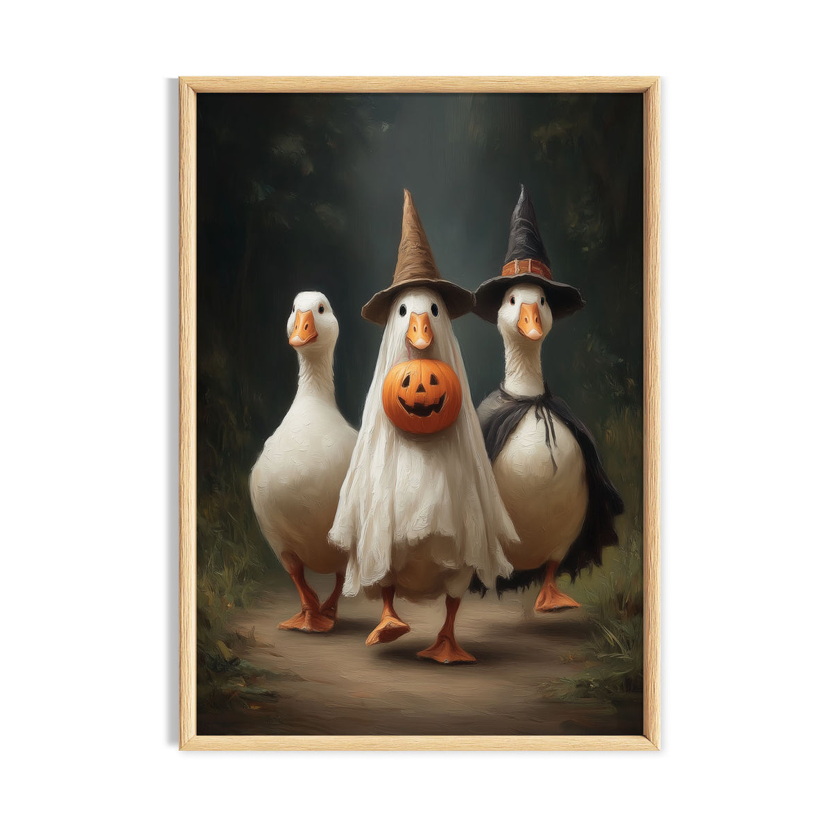 Three funny white geese in Halloween costumes with witch hats, a ghost costume and jack-o'-lantern pumpkin