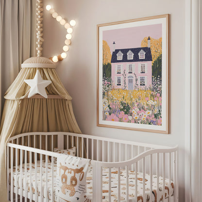Pink floral country house nursery print displayed above a cot