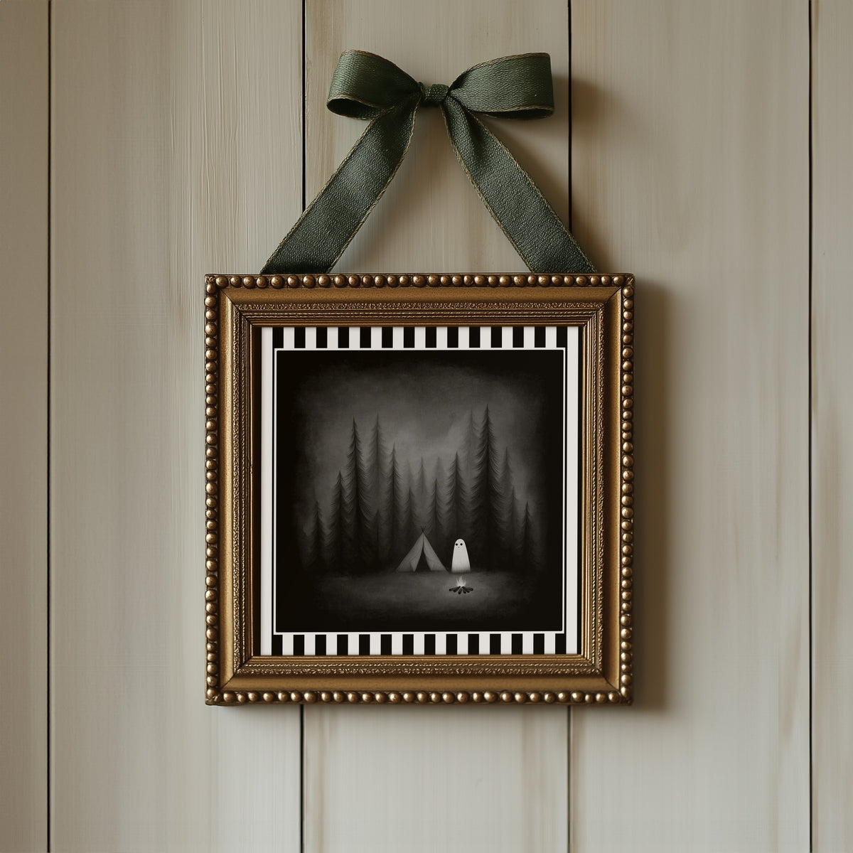 Ghost camping gothic print displayed in an ornate gold frame with green ribbon