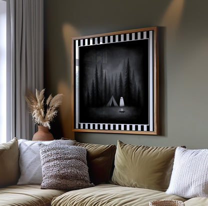 Ghost camping gothic print displayed in a light wood frame above a sofa
