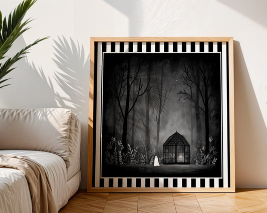 Ghost greenhouse gothic print displayed in a light wood frame in a living room