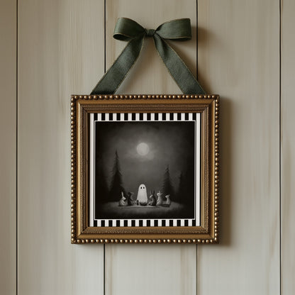 Moonlit ghost picnic gothic print displayed in an ornate gold frame with green ribbon