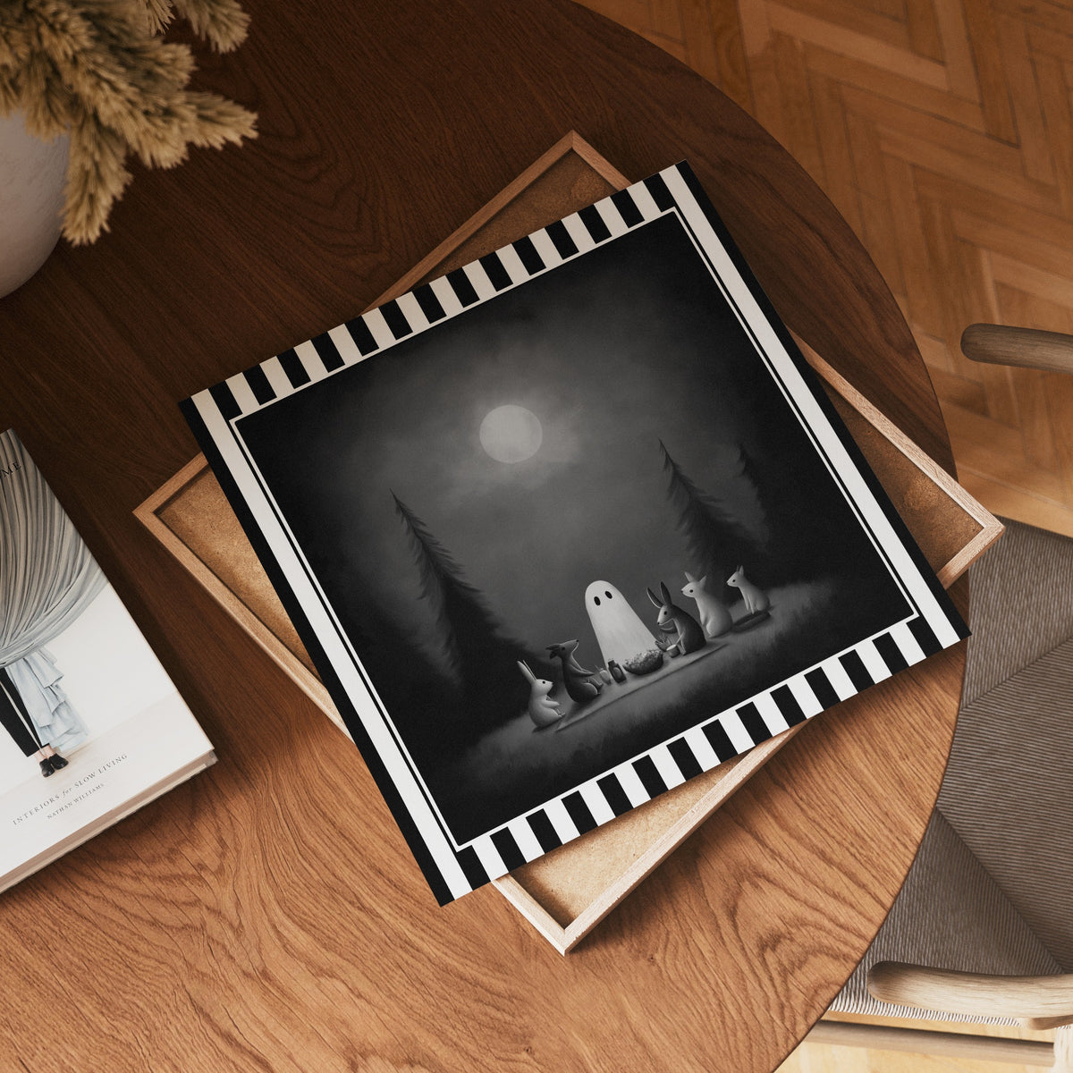 Moonlit ghost picnic gothic print shown as a square print mockup on a wooden table