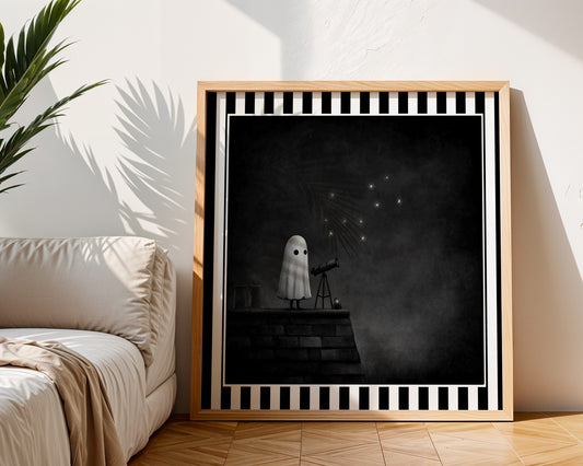 Ghost stargazing gothic print displayed in a light wood frame in a living room