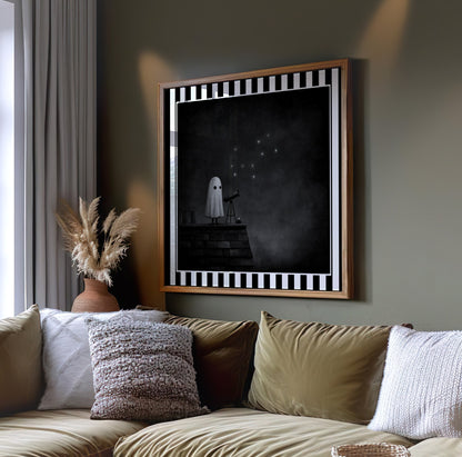 Ghost stargazing gothic print displayed in a light wood frame above a sofa