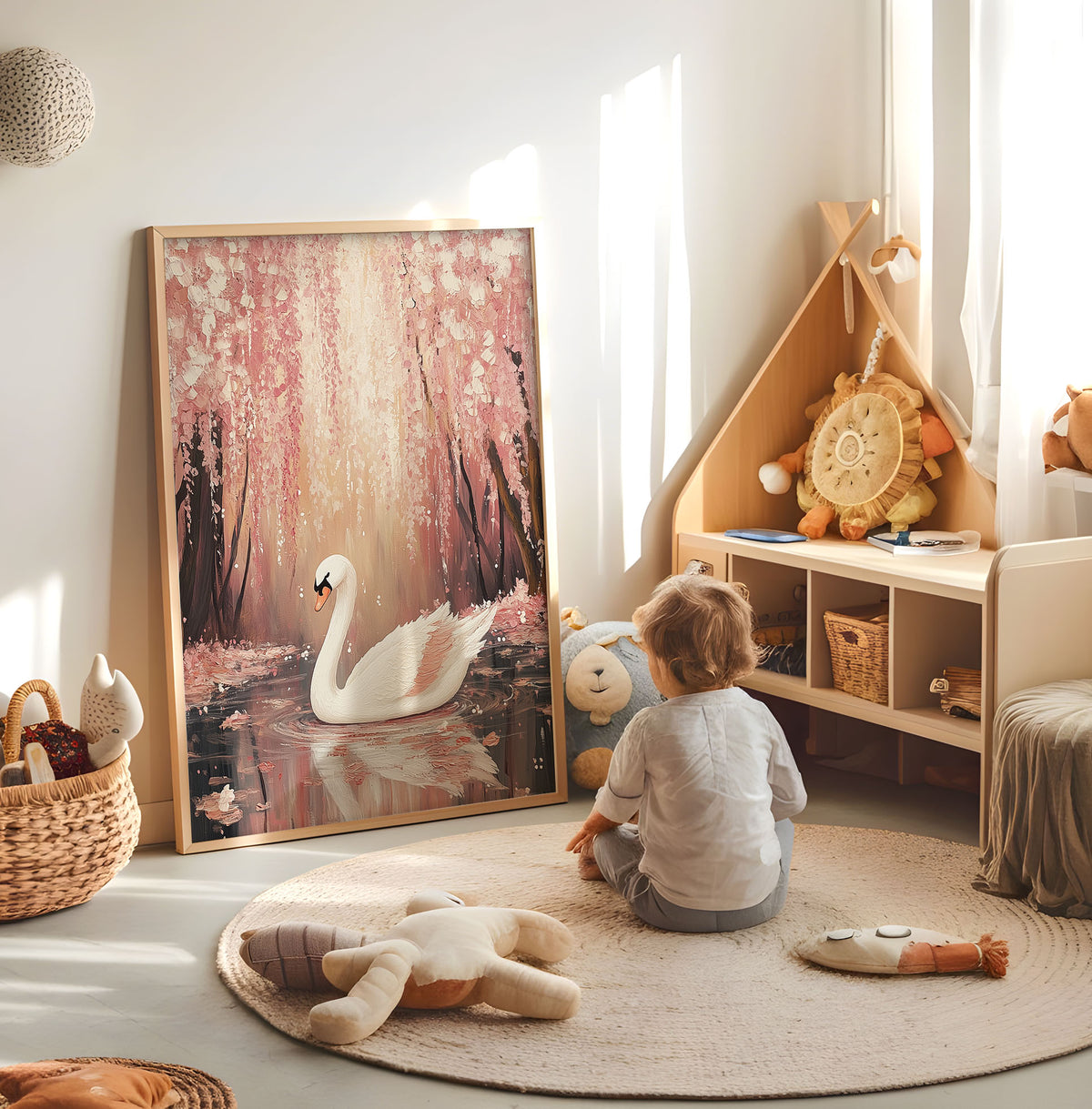 Pink blossom swan nursery print displayed in a bright child's room