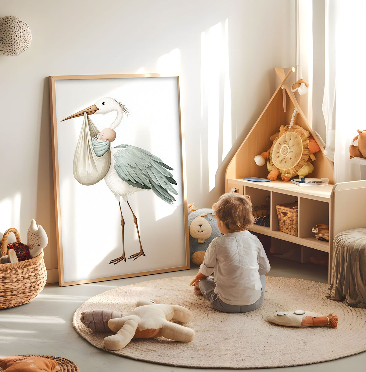 Stork and baby nursery print displayed in a bright child's room