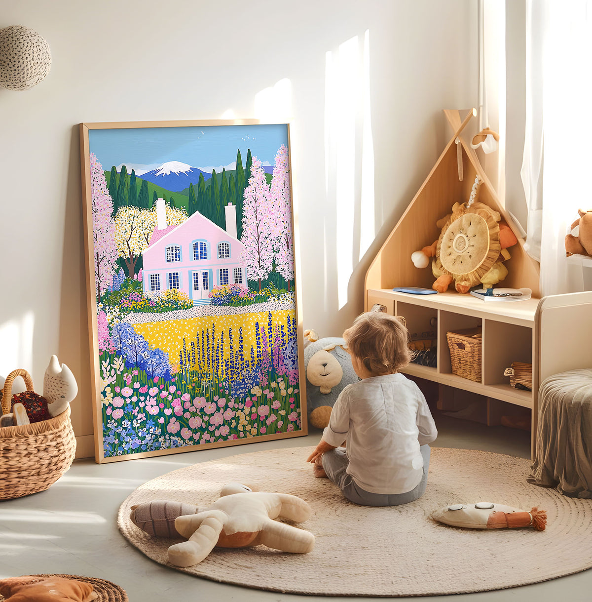 Colourful pink cottage and flower garden nursery print displayed in a bright child's room