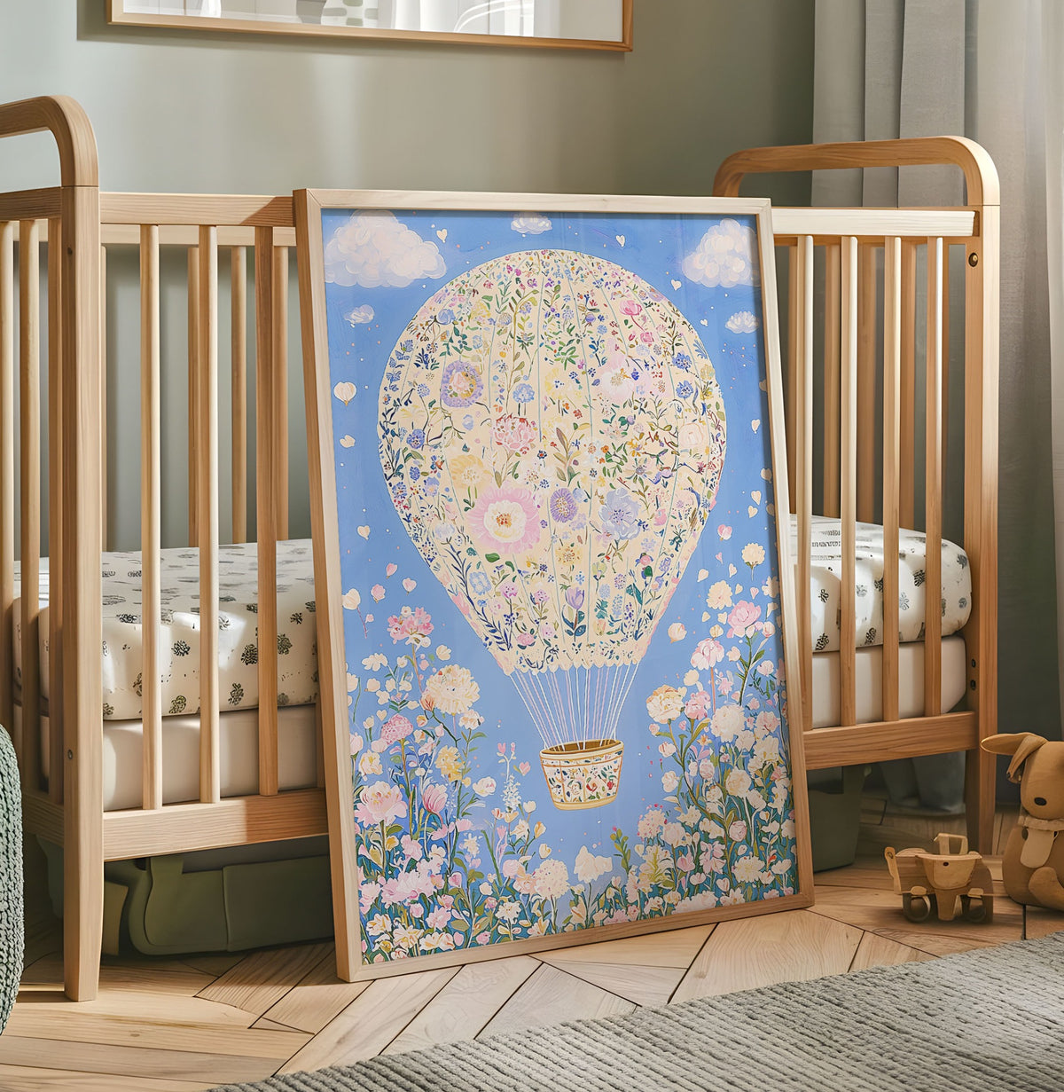 Floral hot air balloon nursery wall art on a soft blue sky with pastel flowers