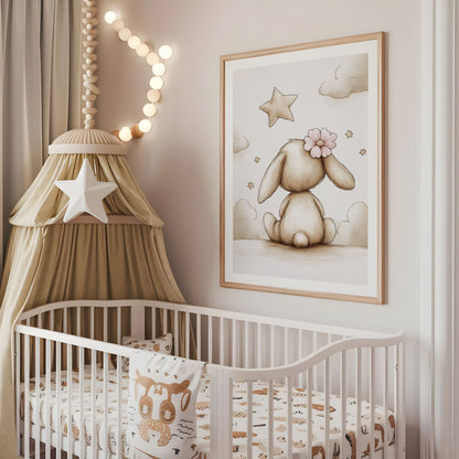 Cute bunny nursery wall art displayed above a cot in a neutral baby room