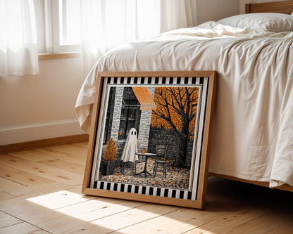 Autumn ghost café print displayed beside a bed in a light wood square frame
