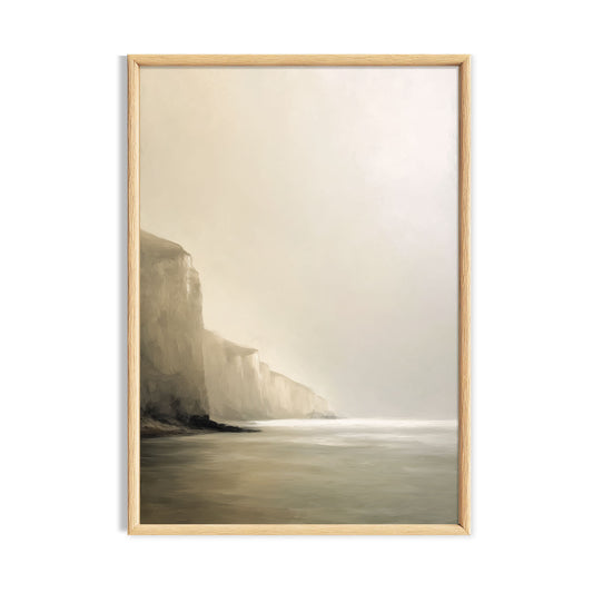 Soft misty coastal cliffs above a calm pale sea.