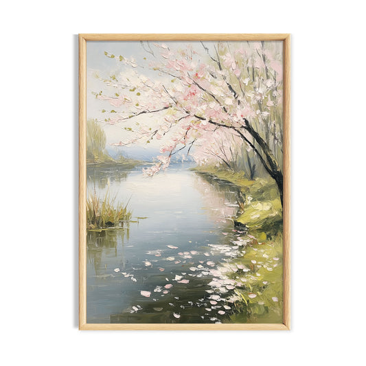 Quiet river bordered by pale blossom trees and soft spring greenery.