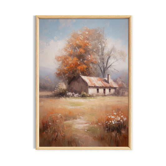 Rustic country cottage beside an orange autumn tree in a soft rural landscape.
