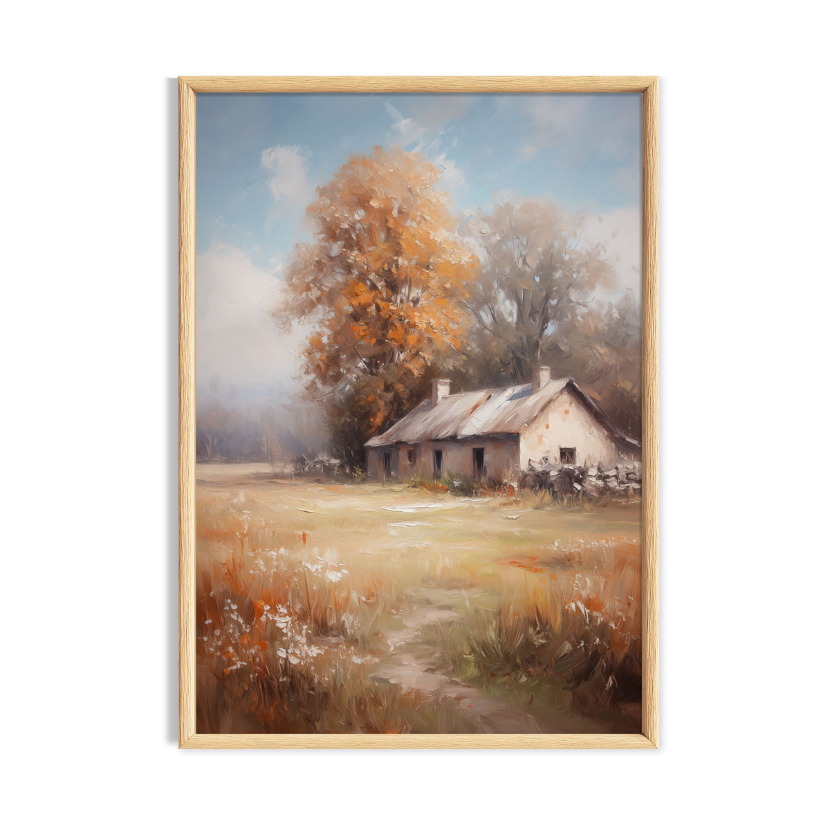 Small white country cottage beneath golden autumn trees in a quiet field.