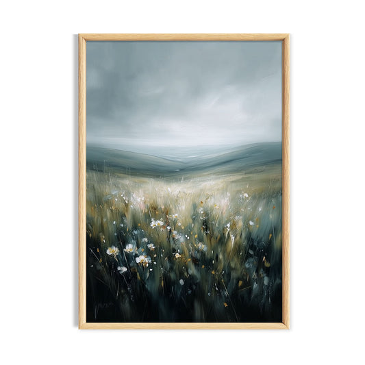Moody meadow of pale wildflowers beneath sweeping grey-blue clouds.