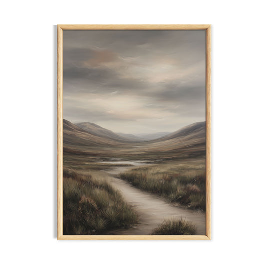 Winding path through a muted moorland valley beneath a grey sky.