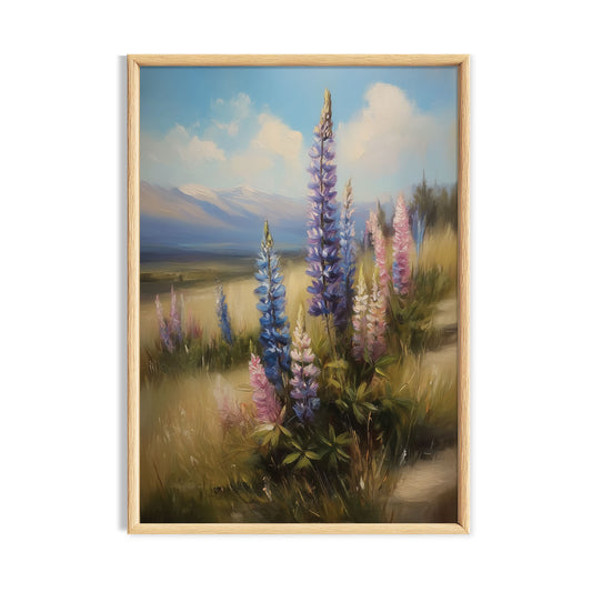 Tall purple lupines flowering beside a peaceful mountain meadow.