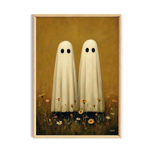 Two simple white ghosts standing together in a warm golden autumn meadow.