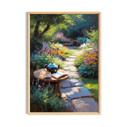 Tea, open book and teapot on a garden table beside a colourful flower path in a sunny cottagecore garden