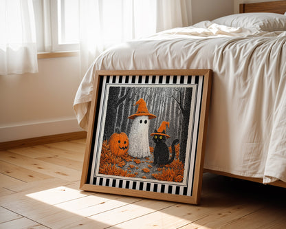 Ghost and black cat Halloween print displayed beside a bed in a light wood square frame