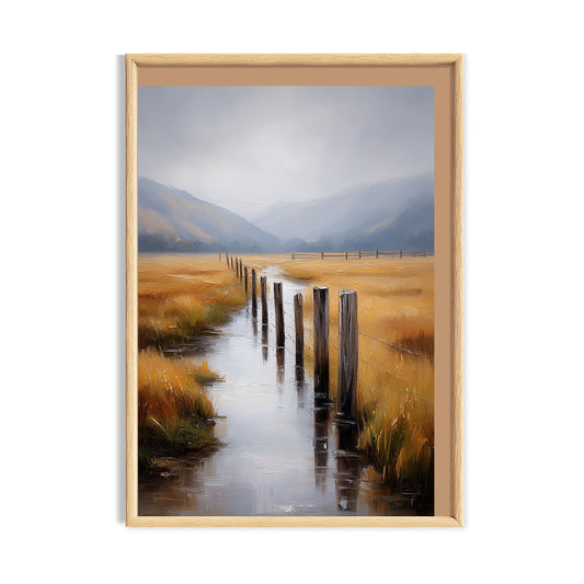 Golden marsh valley with winding stream fence posts and misty mountains cottagecore landscape print