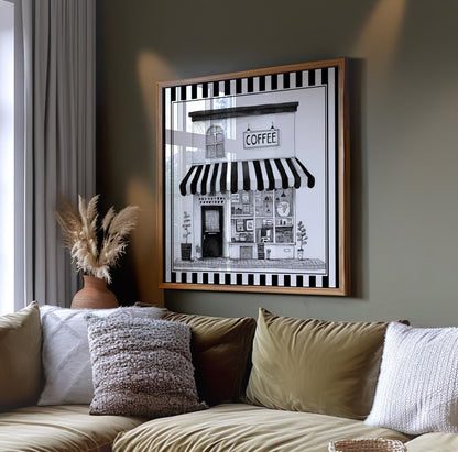 Black and white coffee shop wall art displayed on a dark green wall above a sofa