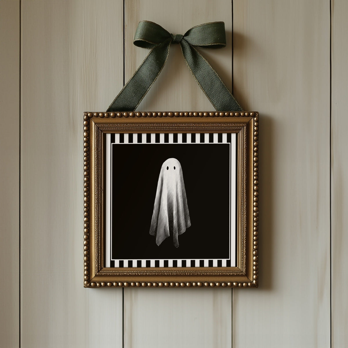 Single white ghost print displayed in an ornate gold square frame with ribbon