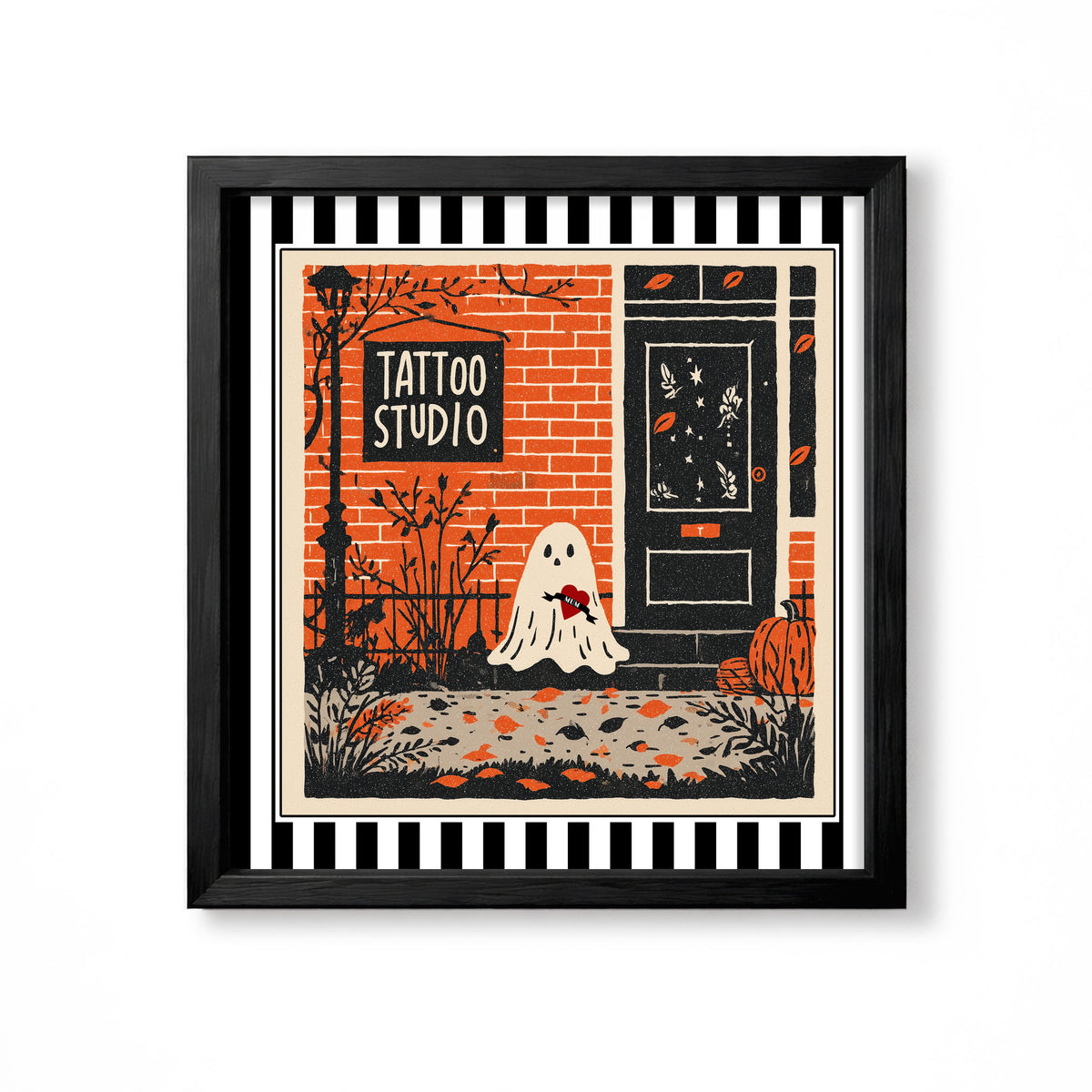 Orange and black tattoo studio storefront with a small white ghost and pumpkin