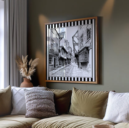 Black and white York Shambles street wall art displayed on a dark green wall above a sofa