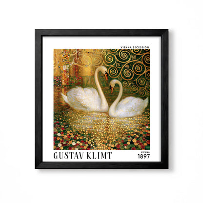 Gustav Klimt style swan square art print in black frame with two white swans, gold water and decorative green spiral detail