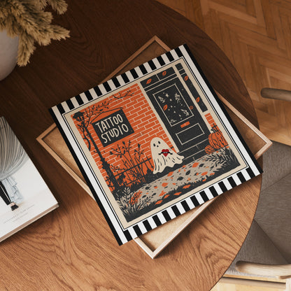 Square tattoo studio ghost print displayed flat on a wooden table