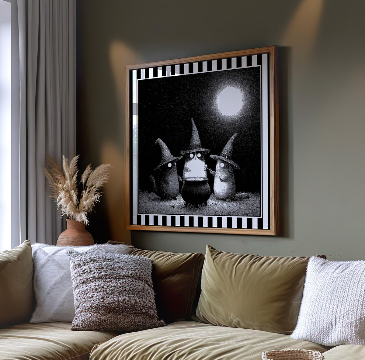 Witch cats moonlit wall art displayed on a dark green wall above a sofa