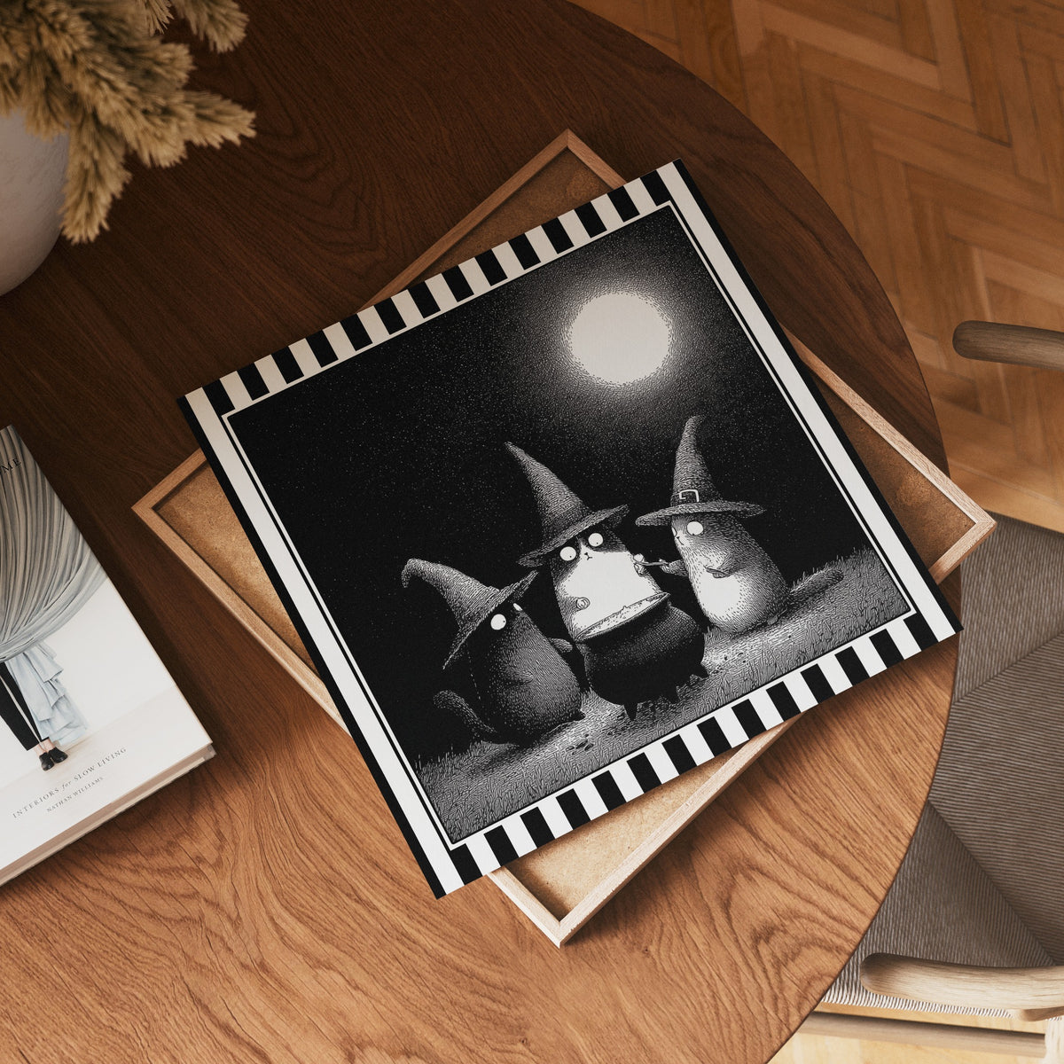 Square witch cats moonlit print displayed flat on a wooden table