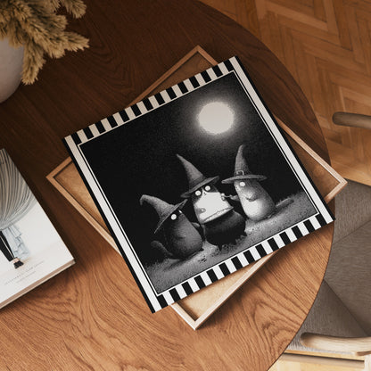 Square witch cats moonlit print displayed flat on a wooden table